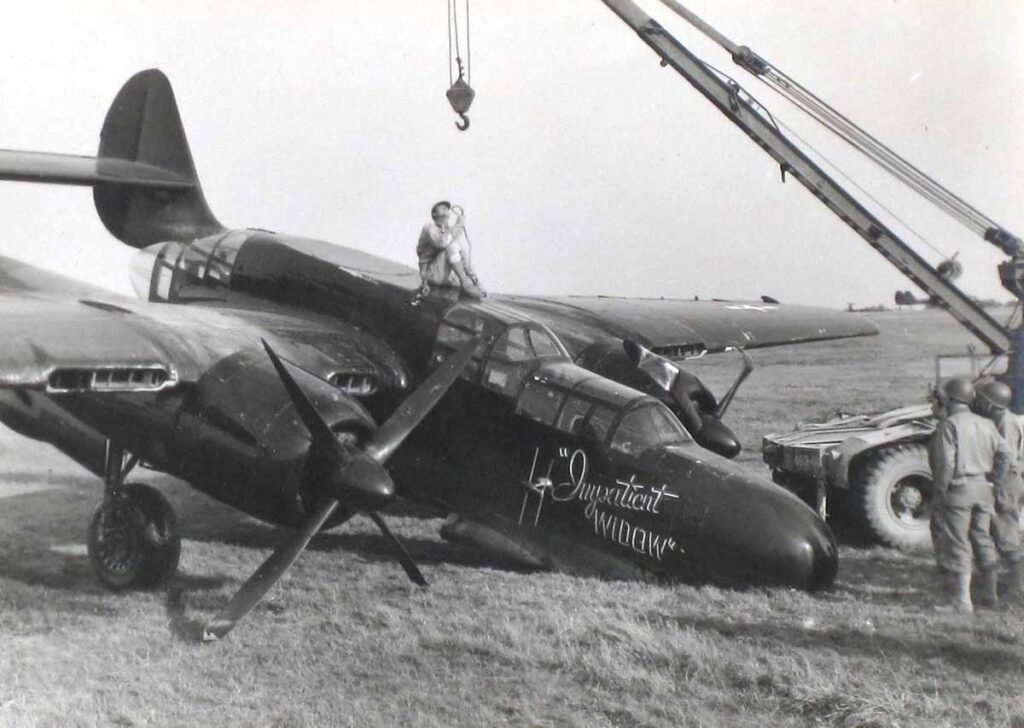 Gordon’s P-61, Impatient Widow, gets attention after some battle damage.