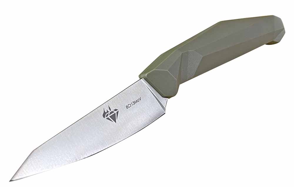  The green handle—an exclusive color for V Nives—of the Emerald Paring Knife is injection molded around the blade tang.