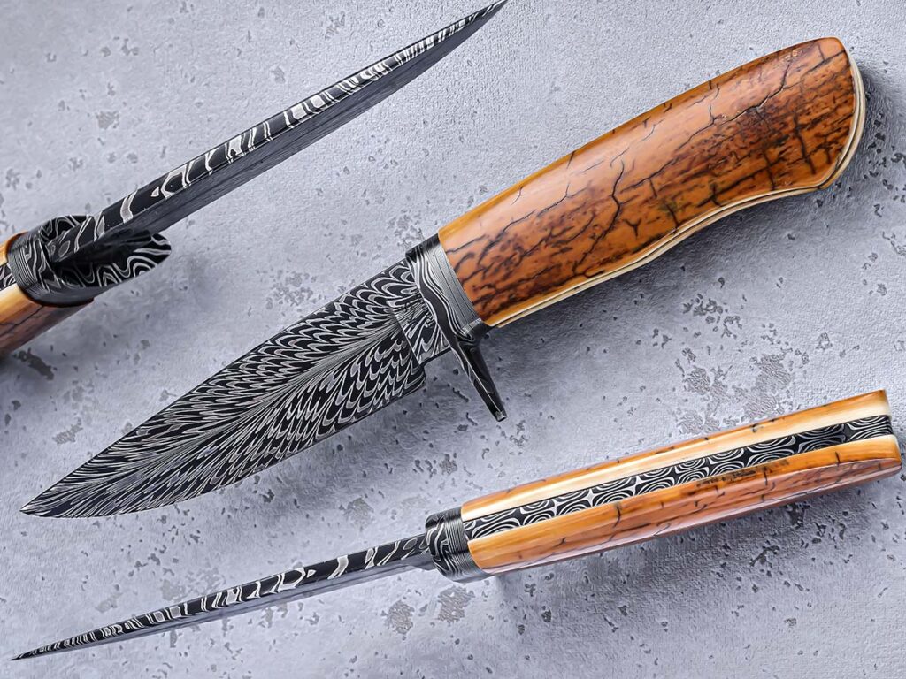 “Feather patterns are very cool because they can be unique yet still hold true to the feather pattern,” Steve Randall observed. He matches up the feather pattern with a mastodon ivory handle on his frame-handle hunter. Overall length: 9 inches. (SharpByCoop image)