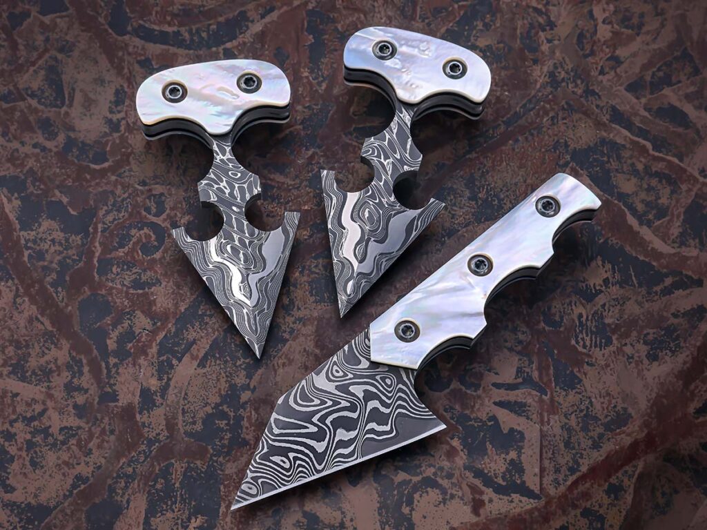 Matt Hunter (inset) has always had a thing for concealed carry knives, but admits his mother-of-pearl handled push daggers were his first crack at the style of knife. Angular and wickedly attractive, the Nichols Slither Armor Core stainless damascus daggers were designed as a matching set with his HawkWing knife, also pictured. (SharpByCoop image)