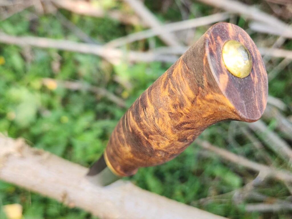 A look along the contour of the Kellam’s grip shows how smoothly a handle’s lines can flow when using a hidden tang.