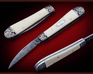 Raymon E. Hunt made this slip-joint folder with pattern-welded steel and pre-ban elephant ivory.