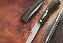 Done in a bolsterless shadow pattern so the shield/silhouette of the F4 Phantom would fit well on the handle, the trapper by Phil Jacob and Ben Champagne for Rusty Preston features scales of a green Micarta® taken from a chafing block cut for an F4 Phantom jet—the same kind of aircraft Rusty flew as an Air Force pilot during the Vietnam War. Blade steel: CPM 154 stainless. (SharpByCoop image)
