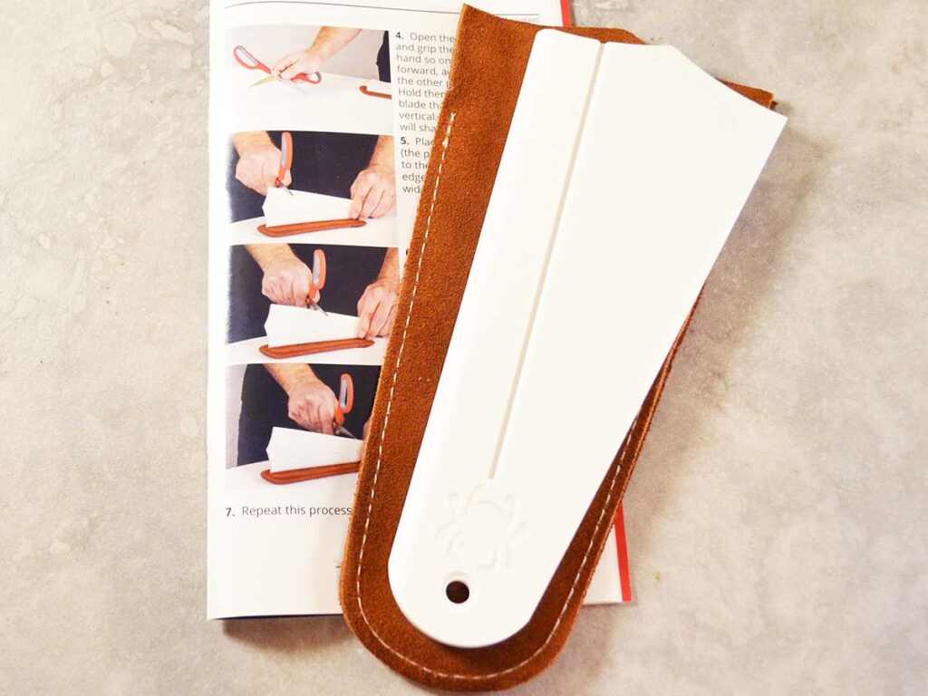 Designed by Spyderco founder Sal Glesser, the Spyderco Golden Stone is an odd triangular ceramic sharpener fit for many uses—one of which is sharpening scissors. For sharpening, position the suede pouch that carries the Golden Stone on a flat base to provide a non-slip surface. (Covert image)