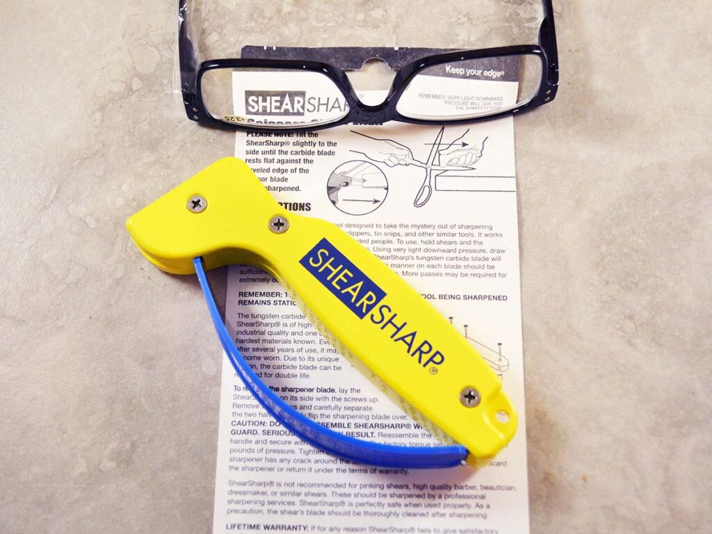 A hand-held design, the AccuSharp ShearSharp Scissors Sharpener addresses the blade bevels one at a time. You’ll need your reading glasses for these instructions, too!