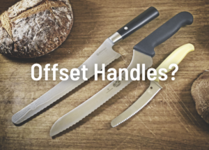  Offset handles save your knuckles grief. From left:
Boker Black Damascus Bread Knife, Victorinox 9-inch Offset Sandwich Knife and Spyderco Blunt-Tip Z-Cut.
