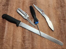 In the center is the Lansky Folding Tapered Diamond Rod Sharpener (MSRP: $19.95). Among the author’s most used and abused serrated edges, clockwise from top: Spyderco Police, Henckels bread knife and Leatherman Wave.