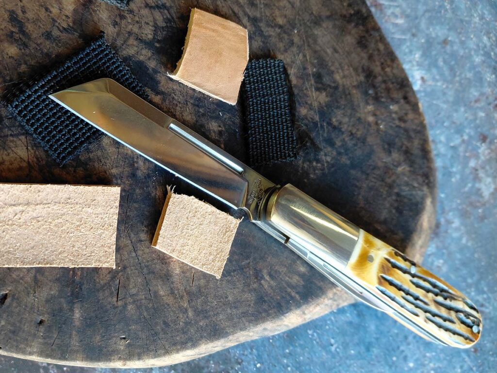 The Sheepfoot Barlow's large blade cut through leather and nylon webbing easily. Meanwhile, the comfortable, tapered handle made pull slicing smooth.