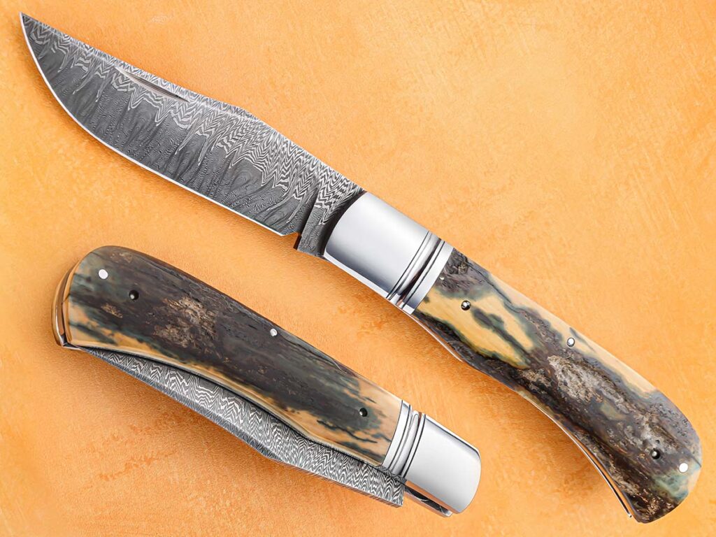 “This knife came about as a class demo for slip joint folders that I taught at Jim Poor’s Flatland Forge in Tuscola, Texas,” said Bill Burke of his single blade trapper, with a 3-inch stainless damascus blade and blacklip mother-of-pearl handle scale. (SharpByCoop image)