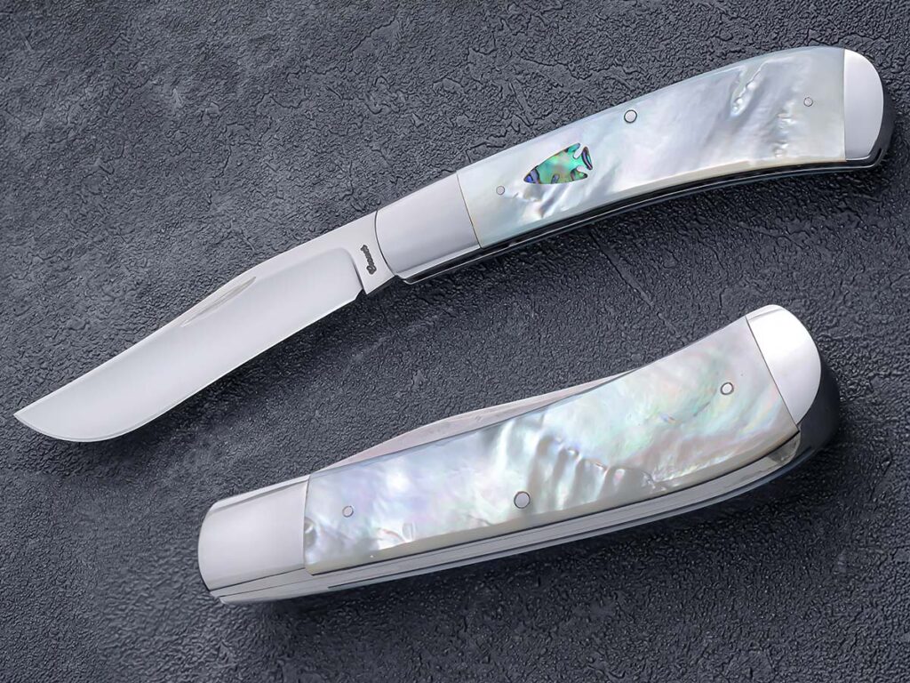 Bubba Crouch points to the influence of Slip Joint Cartel icon Bill Ruple in his career. More than anything, Ruple taught him to “make the next knife better than the last one.” Crouch’s pearl-handled trapper demonstrates that the knifemaker has taken this lesson to heart. The natural scale presented concerns in chipping, shattering, and even burning. (SharpByCoop image)