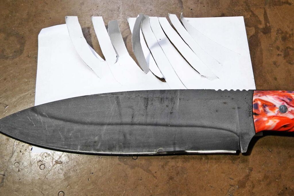 Battle blade cuts paper