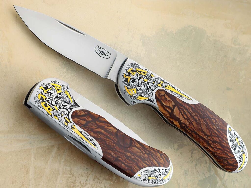 Dennis Friedly opts for CPM 154 stainless blade steel and a mammoth tooth handle for his Art Knife Invitational fighter. The copious engraving is by Ray Cover Jr. Overall length: 13 inches. (SharpByCoop image)