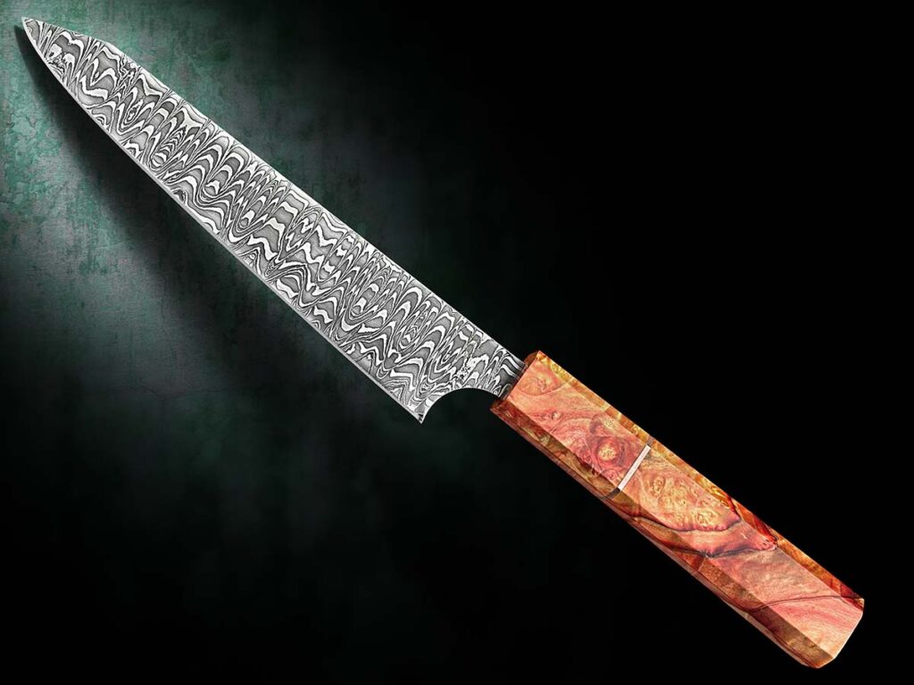 Chad Jefferson chose 1080 and 15N20 to forge into a ladder W’s pattern for the 7-inch blade of his gyuto. (ak74forge@gmail.com) (Jocelyn Frasier image)