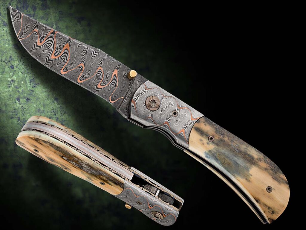 A damascus of 1084, 15N20 and copper forged by Baker Forge & Tool comprises the 3.25-inch blade of Stephen Roney’s linerlock folder. (s.roney@myyahoo.com) (Jocelyn Frasier image)