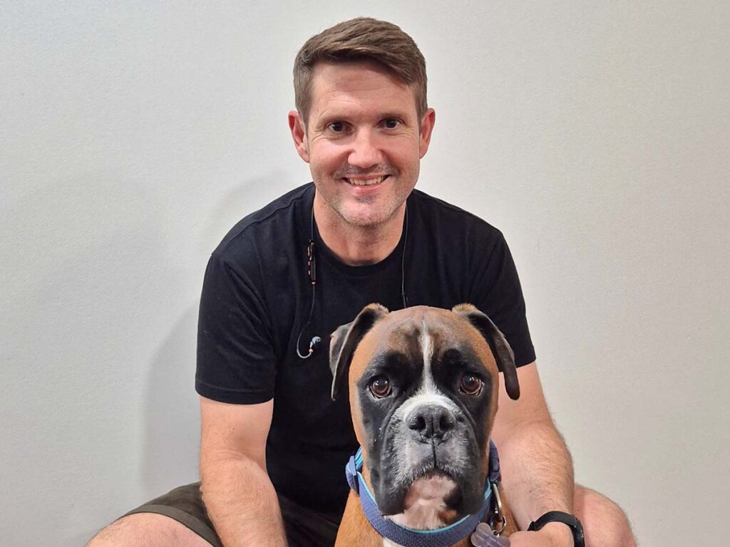 Stuart Kerr and Zeus the boxer.