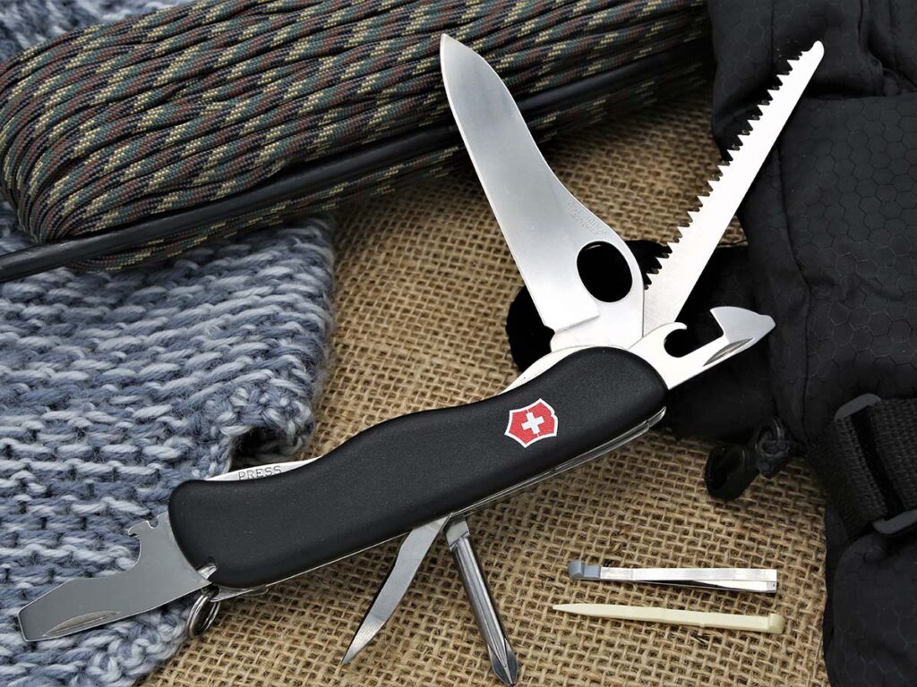 The One-Handed Trekker, utilized by the author on various Amazon Jungle and backpacking excursions, includes a locking screwdriver and blade.