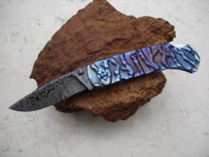 Tim Lambkin of Chops Knives made this lightweight EDC knife with flame-anodized titanium scales.
