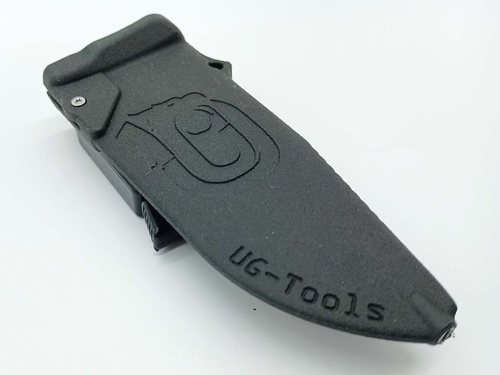 UG’s design prowess overflows to the TiNy’s sheath, a sturdy Kydex unit with a retention-adjustment screw and UltiLink for unlimited attachment/carry options. An aside, given the hollow handle, it makes a very satisfying ping when clipped all the way into its sheath.