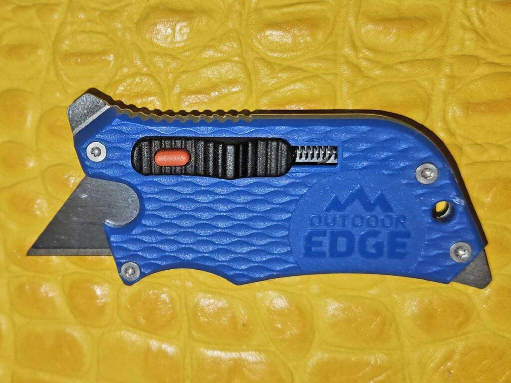 The Outdoor Edge SlideWinder has utility beyond cutting. At the 12-o’clock position, over the blade, is a bottle opener, at 1 o’clock is a flat-head screwdriver and at 7 a flat Phillips-head screwdriver. 
