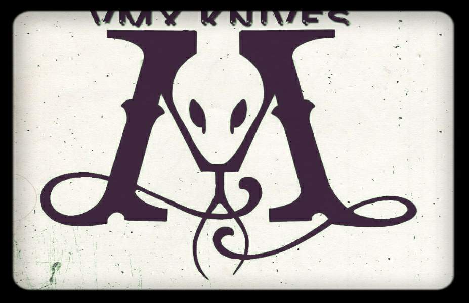 Zach Burcham of West St Tattoos in Glasgow, Kentucky, designed the VMX Knives logo. 