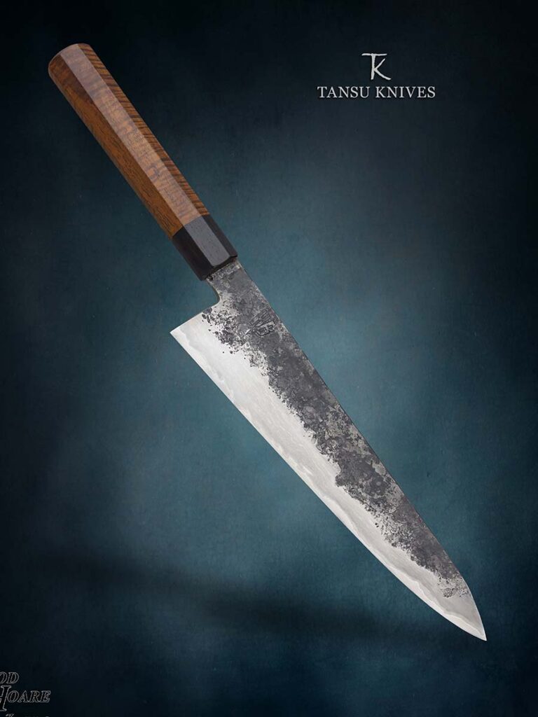The wa handle of Mert Tansu’s gyuto has a half-inch-wide, 4-inch dowel (above) with a tang slot cut into it. “It is a traditional-shaped wa except for the internal structure,” Mert wrote. “While most Japanese blades are mounted to the handle with burning the tangs in, this is not possible with a hard timber-like ringed gidgee, and I glued mine in.”