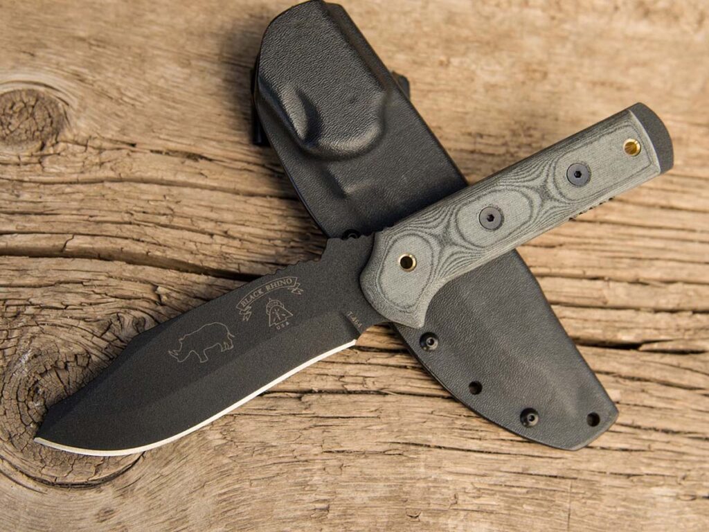 A TOPS Knives Black Rhino was lost when a desert barracks burned to the ground. The scales were completely gone and the knife could not be repaired. TOPS sent the destroyed piece back to the serviceman along with a brand-new Black Rhino like this one.