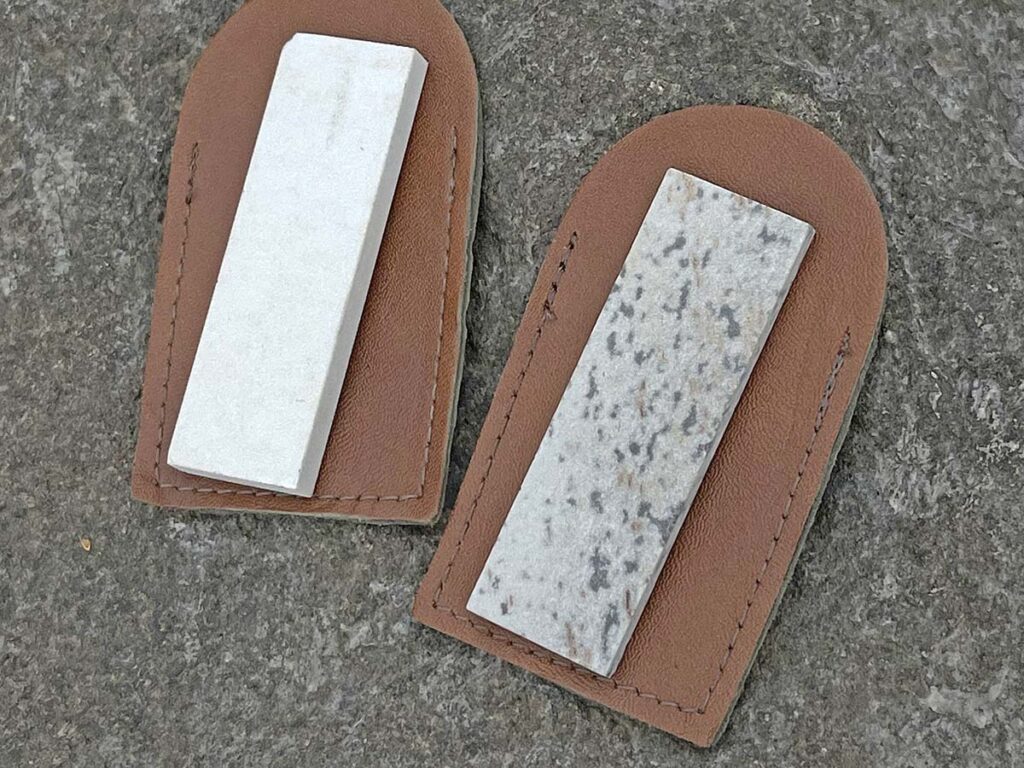 Similar to many sharpening systems, Arkansas stones of different grit sizes are used in conjunction. On the right is a soft stone with a courser grit, good for raising a burr and initial honing. On the left is hard stone, used for final edge polishing and day-to-day maintenance. (Image courtesy of Chris Stillian)
