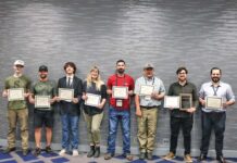 The eight new ABS journeyman smiths, (from left) Jordan Buckley, Cody Adolphson, Kale Cope, Jessica Peterson, Patrick Harp, Jeff Schafer, Renan Scariot and Ronaldo Franceschi. (Image courtesy of Kevin Cashen)