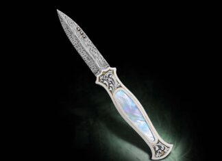Putting his sole-authorship philosophy on full display, Ethan Kolar's folding dagger not only boasts an impeccable feather damascus blade, but an ornate handle including engraving from the smith himself. The white-lipped mother of pearl ups the eye appeal of this eclectic build. (Jocelyn Frasier image)