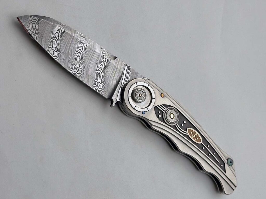 Next to his mechanical contributions to knifemaking, the author points to Walker’s eclectic use of materials and eye for design as important influences to the knife world. The above slide lock is an example, with the distinctive art deco stylings, with multiple metals used on the handle’s inlay. (David Ellis image)