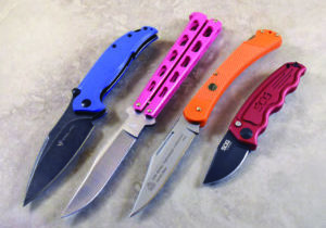 A lot of color to be had in the cutlery world includes, from left: Steel Will Scylla Blue, Bear & Son 5-inch Pink Butterfly, Puma SGB Orange Featherweight Hunter and SOG-TAC CA Auto.