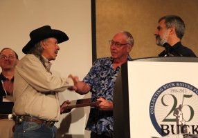 David Yellowhorse enters the Buck Collectors Club during the Buck Collectors Silver Anniversary gala. From left: Larry Oden, David Yellowhorse, Gene Merritt and John Foresman.