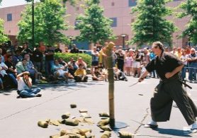 James Williams cuts the straw mat in his BLADE Show Japanese sword demo.