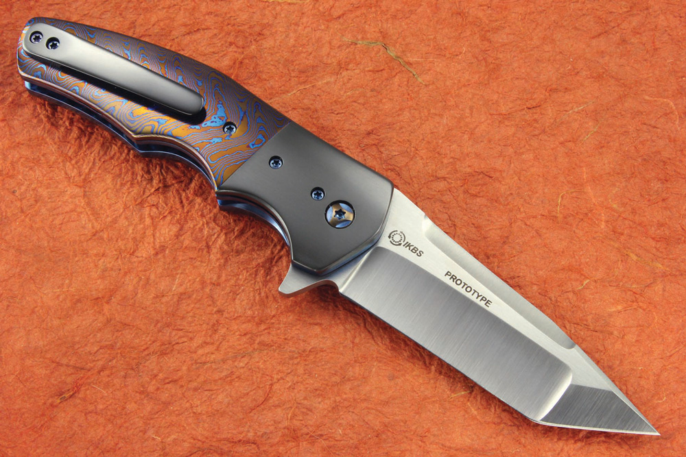 Kirby Lambert resumes his perennial presence on the to-watch list of Neil Ostroff of True North Knives with such models as the Prototype Crossroads flipper in CTS XHP stainless steel, a Mokuti handle with zirconium bolsters and an IKBS bearing system. (TNK image)