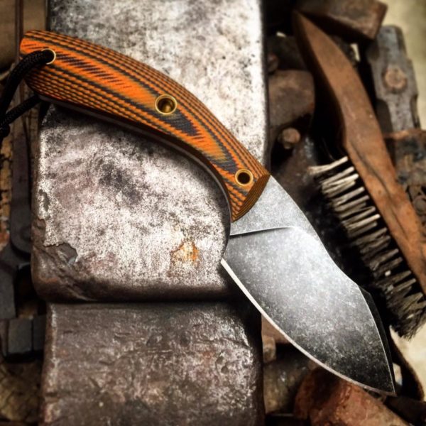 Alex Smith offers the APEX with orange and black G10 scales.