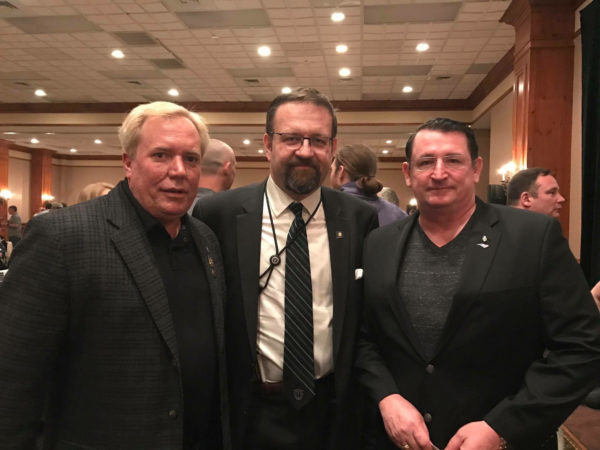 Sebastian Gorka, military and intelligence analyst, stopped to chat with the co-owners of Spartan Blades, Curtis Iovito and Mark Carey.