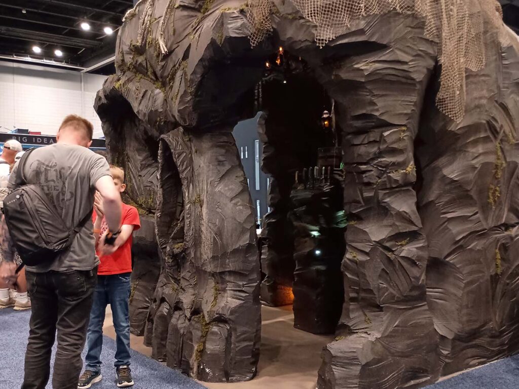 Big Idea Designs always pull out the big guns when it comes to booth layout. This year’s was a skull-shaped cave with a treasure trove of the company’s knives inside (left). (Elwood Shelton image)